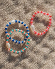 Perlen-Stretchring Mutiara, blau-orange