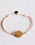 Armband Smiley pfirsich-gold