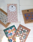 Papiergeschenktüten klein, Mix mit 2 Designs braun/blau, 24 Stück