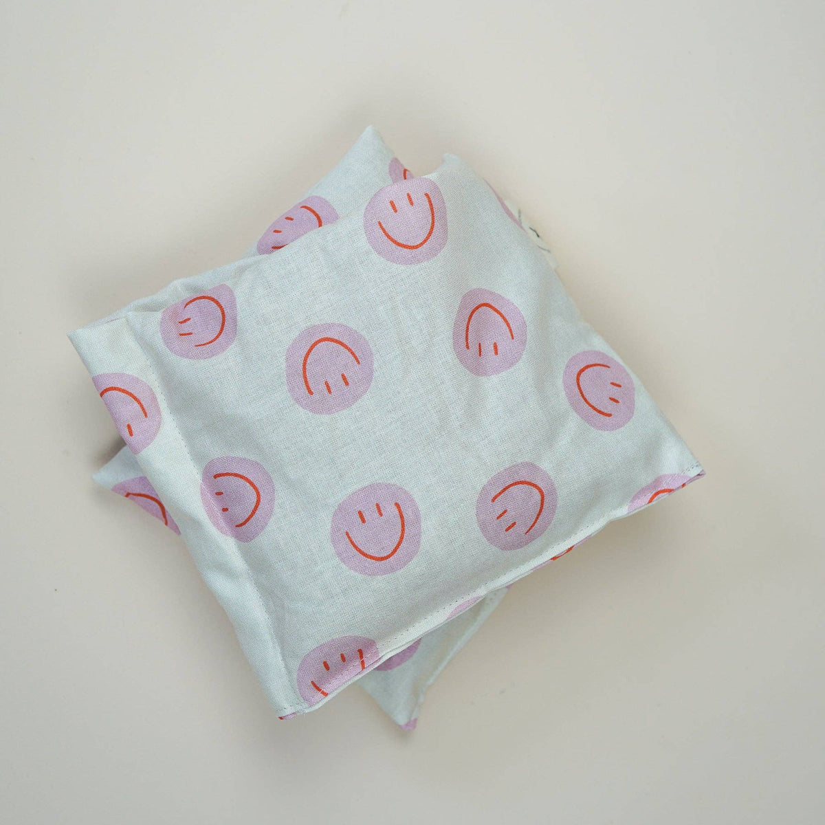 Wärmekissen Smiley Pink - längliches Kammerkissen warm+ Kalt