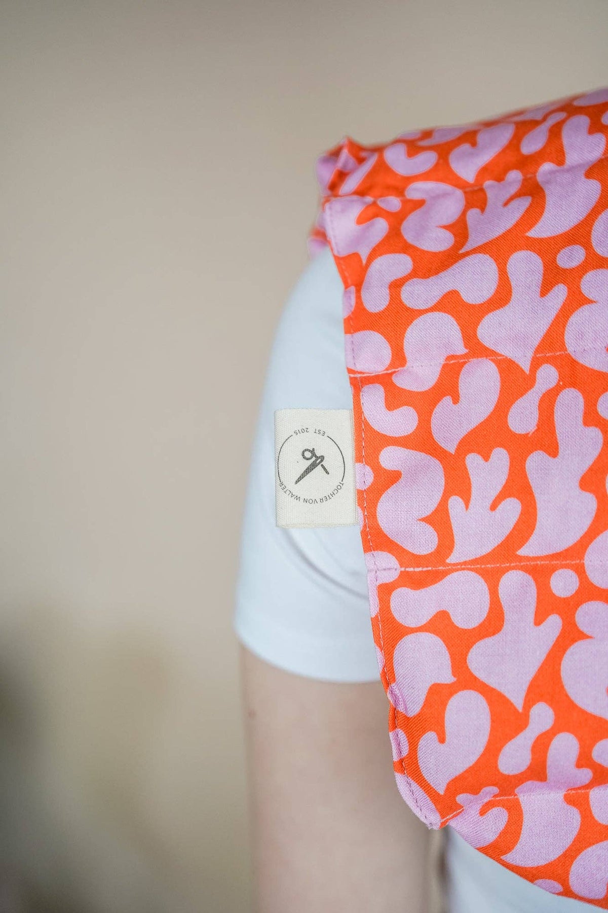 Nackenkissen mit Dinkelfüllung, orange-pink