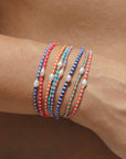 Perlenarmband Mutiara türkis-orange