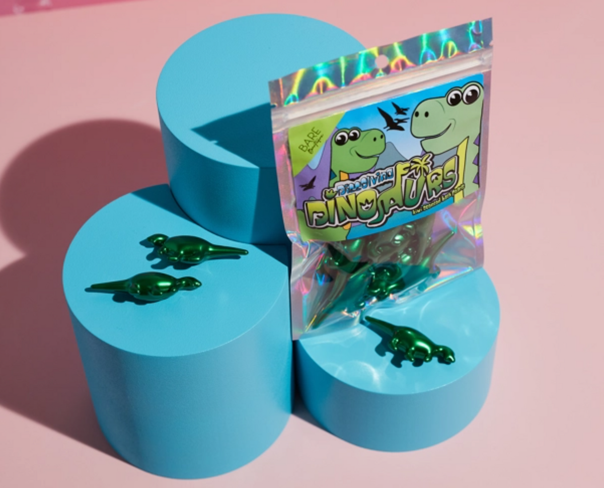 Badeperlen in Dinoform mit Kiwiduft