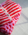 ärmellose gestreifte Strickweste, rot-rosa