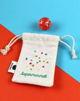 Supermurmel im Stoffbeutel mit Stick, orange