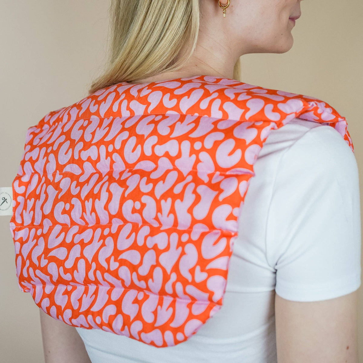 Nackenkissen mit Dinkelfüllung, orange-pink