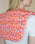 Nackenkissen mit Dinkelfüllung, orange-pink