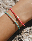Perlenarmband Mutiara rosa-rot